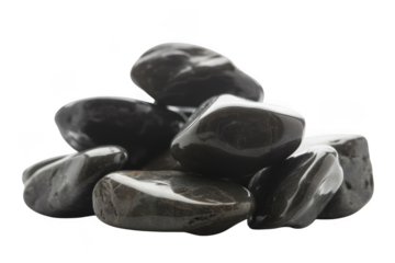 Pile of smooth black river stones isolated on transparent background