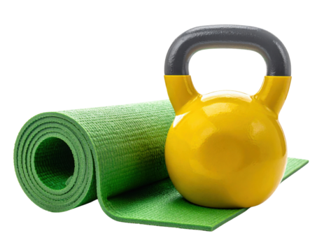 A bright yellow kettlebell rests next to a rolled green yoga mat, perfect for workouts and fitness routines.