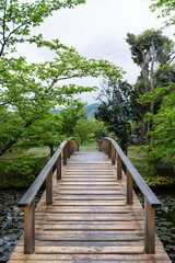 Fototapeta premium wooden bridge over river