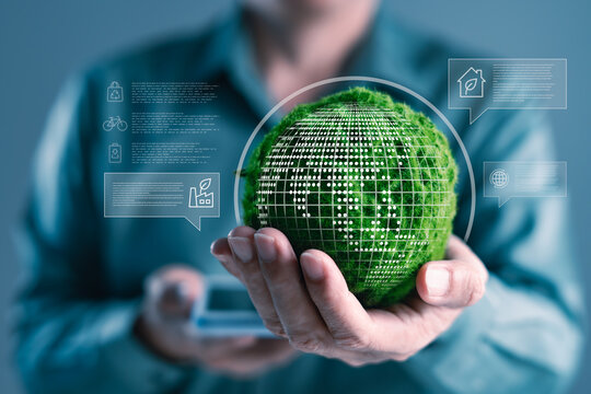 Hands holding green moss globe with digital eco icons representing smart environmental technology, green innovation, and sustainable digital transformation