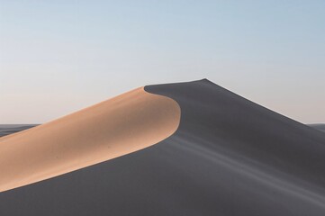 Tranquil Minimalist Abstract Background of a Sand Dune with Light and Shadow