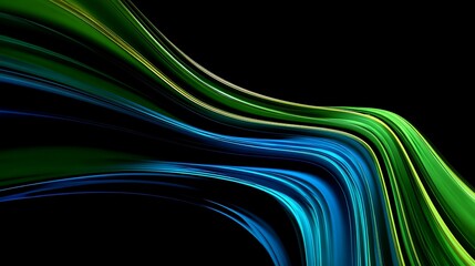 Nice photo of abstract light trails in green and blue colors on a black background.