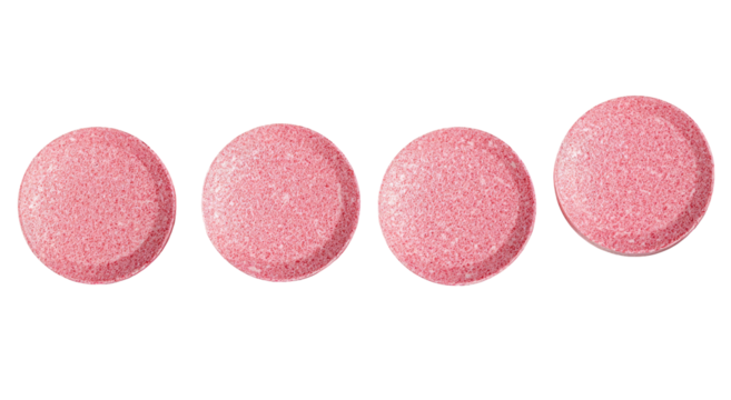 Row of pink round pills