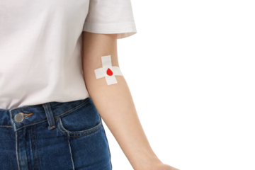 Individual has a bandage on arm after giving blood, isolated on white, PNG