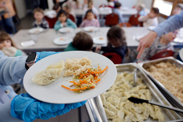 School canteen in a primary school. Lunch. France.