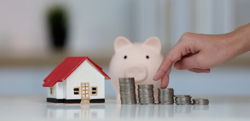 Financial management. Organizing coins and a piggy bank for savings.