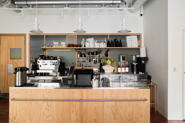 Modern coffee shop interior with minimalist design and bright lighting