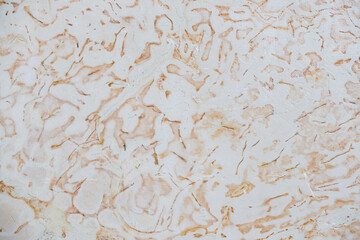 Dolomite texture. Natural rock with beautiful beige patterns on the surface. Polished flat stone. Classic luxury decoration building material. Solid stone background.