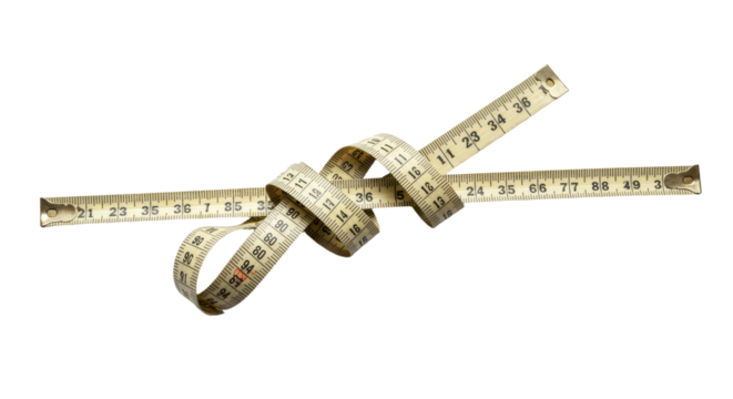 Flexible measuring tape twisted with wooden ruler isolated on black background, perfect for tailoring and sewing projects