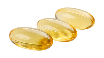 Three translucent golden yellow gel capsules lie diagonally in a gentle row. They are isolated on a transparent background, a clear png image.