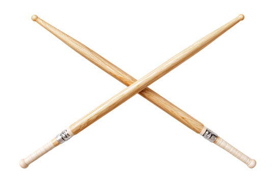 Two wooden sticks, crossed, against a black backdrop, ready to play music