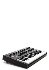 Black Music Synthesizer Keyboard with Knobs and Keys on White Background