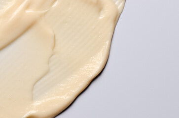 The texture of a cosmetic cream or balm. Copy space