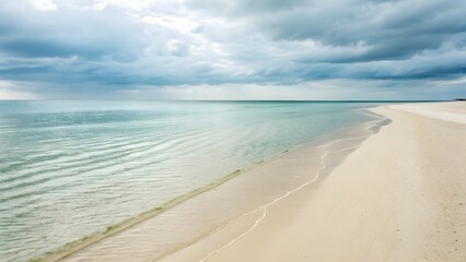 Fototapeta premium Delicate Sea Breeze Gently Stirring Soft Ripples Near Empty Beach – Tranquil Coastline Bathed in Warm Morning Light, Whispering Calm Waters and Peaceful Coastal Serenity Unfold