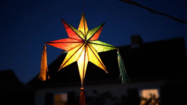 Beautiful Diwali decoration star with colorful light at night, holiday celebration, cultural festival, festive backgrounds, spiritual symbol,