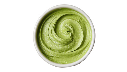 Overhead view of a circular white bowl filled with creamy, swirled, pale-green food