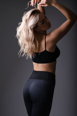 Naklejka premium Woman Posing in Athletic Wear