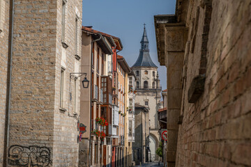Narrow Medieval Street View to Santa Maria Cathedral Tower in Old Town, Vitoria-Gasteiz, Basque Country
