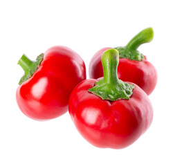 Sweet round peppers isolated on white background. Ripe round red paprika. Clipping path.