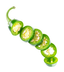 Fresh jalapeno pepper isolated on white background. Slices of green hot serrano pepper. Clipping path. Top view.