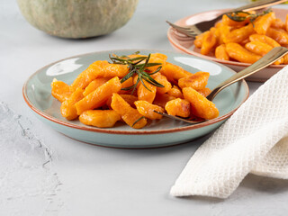 Pumpkin recipe homemade gnocchi on pastel color background