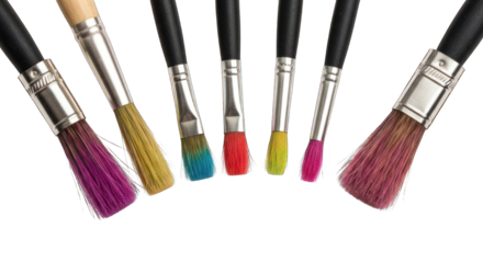 Several paintbrushes with colorful tips arranged against a black background