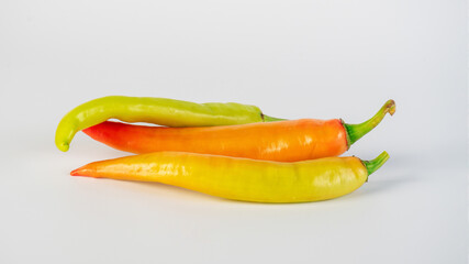 Orange sweet pepper on white background