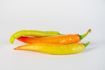 Orange sweet pepper on white background