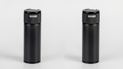 Black cosmetic product on white backdrop and photo props