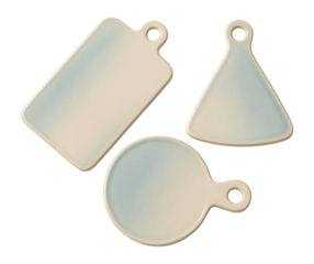 Ceramic cheese boards in assorted shapes, perfect for themed platters at home events.