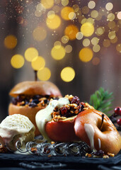delicious christmas apple with ice cream and vanilla sauce against festive background
