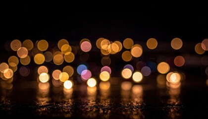 Bokeh blurry spots glow with warm & cool light on dark ground