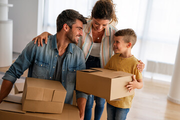 New home, box and parents with child in new house, property mortgage and real estate investment.