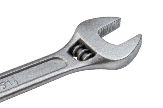 A close-up studio shot presents a metallic adjustable wrench against a stark black background