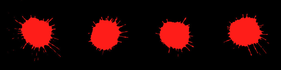 4 rote Farbkleckse auf schwarzem Hintergrund