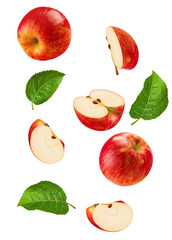 compositional photograph displaying red apple elements: two whole fruits, multiple halves and slices, along with several fresh green leaves, scattered and isolated on a transparent background.