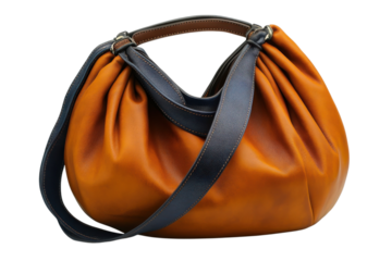 Stylish orange leather handbag with blue strap showcases fashion accessory on transparent background
