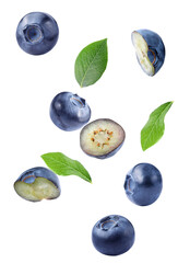 dynamic still life featuring multiple ripe blueberries, both whole and cut in half, interspersed with fresh green leaves, scattered and floating composition, isolated on black.