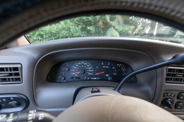 2004 V8 Turbo Diesel truck American 4X4 SUV off-road vehicle leather interior dashboard details, odometer, tachometer, gauges, close up view