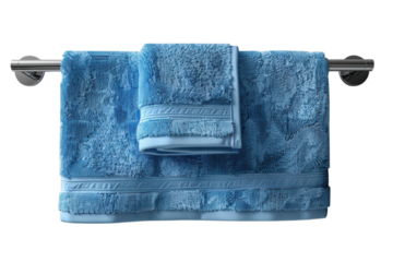 Two soft blue towels hang neatly on a chrome towel rack in a modern bathroom setting on transparent background