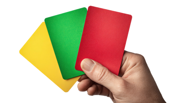 Hand holding three colored rectangular cards against a black backdrop, showing varying hues