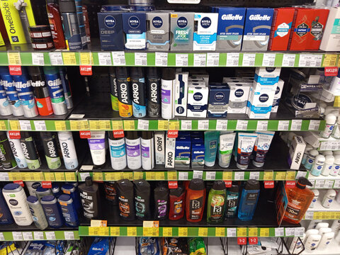 Zvyagel, Ukraine - October 14, 2025: Shelves filled with various personal care products including Nivea, Gillette, and Arko, showcasing a selection of grooming essentials in a retail environment