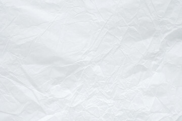 Abstract white crumpled and creased recycle paper texture background