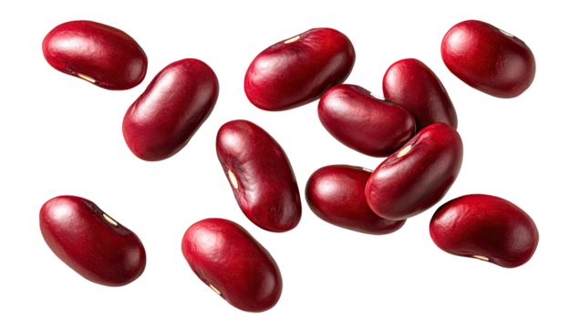 Close-up shot of several smooth, shiny, dark red kidney-shaped beans scattered