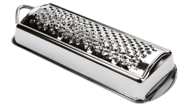 Close-up of a shiny, metallic rectangular kitchen grater with perforations and a handle