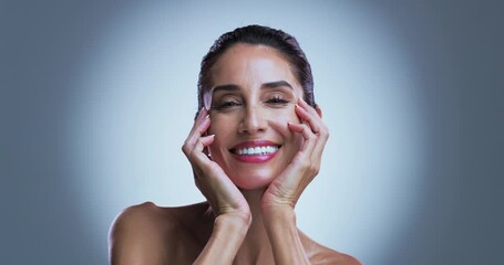 Face, mature and woman in studio with happiness for wellness, skincare or anti aging benefits. Beauty, female person and smile with spotlight for smooth skin, dermatology or pride on gray background.