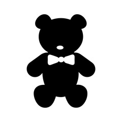 Black silhouette of a teddy bear with a bow tie in white background