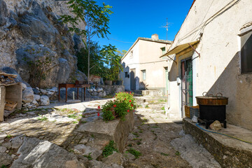 A narrow street among the old houses of Atena Lucana, a village in the province of Salerno, Italy.