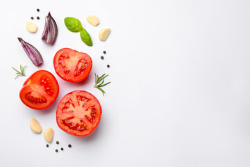 Fototapeta premium Ripe red tomatoes, spices and herbs on white background, flat lay. Space for text