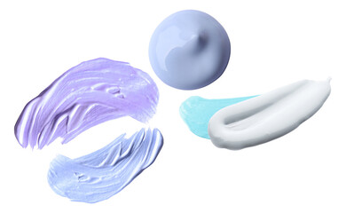 cosmetic makeup swatches featuring various pastel tones including lavender, lilac, white, and cyan cream texture blobs isolated on black photograph.